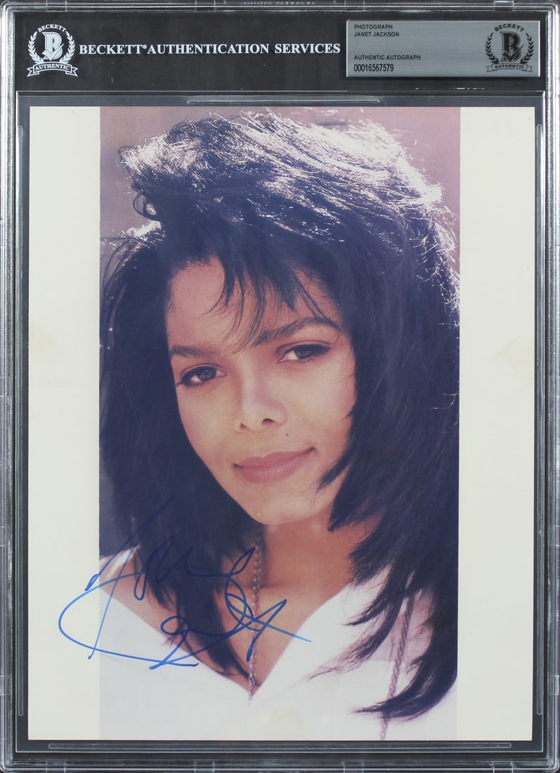 Janet Jackson Signed 8x10 Photograph Beckett Authenticated and Slabbed: Janet Jackson Signed 8x10 Photograph Beckett Authenticated and Slabbed This is an original 8x10 photograph personally signed by Janet Jackson. The autograph has been authenticated and slabbed by Becke