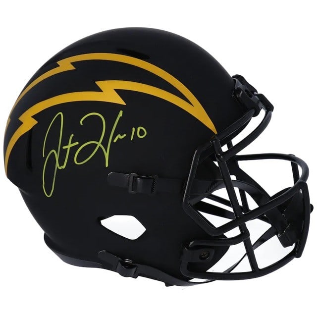 Justin Herbert signed Fanatics Authentic Eclipse Speed helmet Chargers: Justin Herbert signed Fanatics Authentic Eclipse Speed helmet Chargers This is a replica Los Angeles Chargers Eclipse Speed helmet hand-signed by Justin Herbert. The helmet features a black finish and