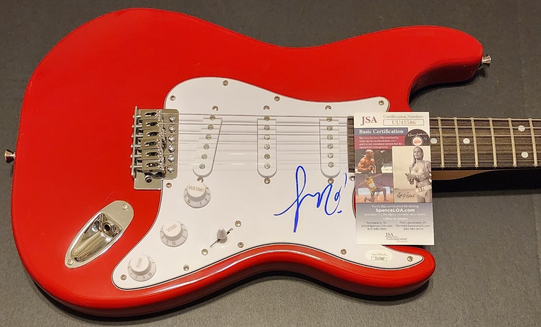 Electric Guitar Signed by Lizzo with JSA Authentication: Electric Guitar Signed by Lizzo with JSA Authentication This pre-owned electric guitar and guitar pick are hand signed by Lizzo and come with authentication from James Spence Authentication (JSA). The