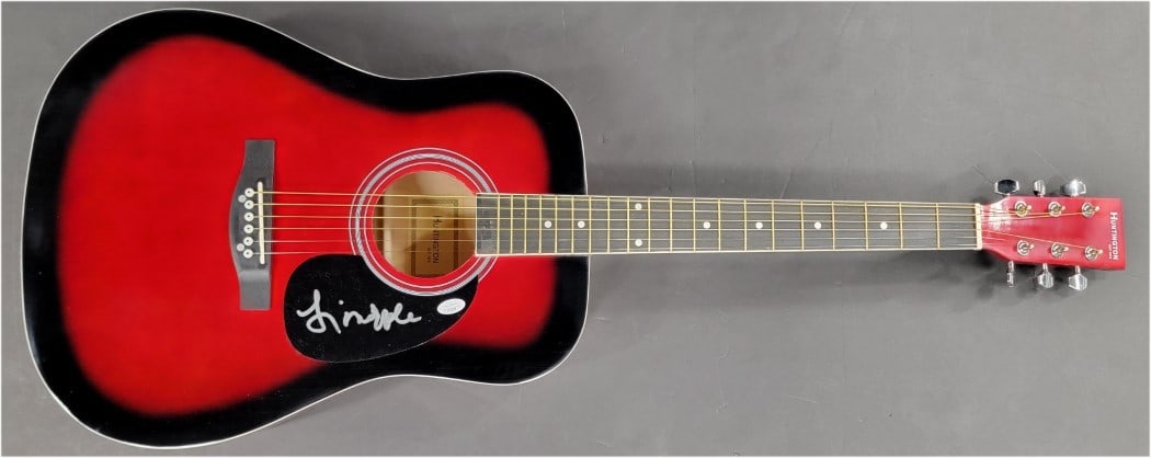 JSA authenticated Fiona Apple signed acoustic guitar: JSA authenticated Fiona Apple signed acoustic guitar This acoustic guitar has been hand signed by Fiona Apple and comes with authentication from James Spence Authentication (JSA). The item is a pre-ow