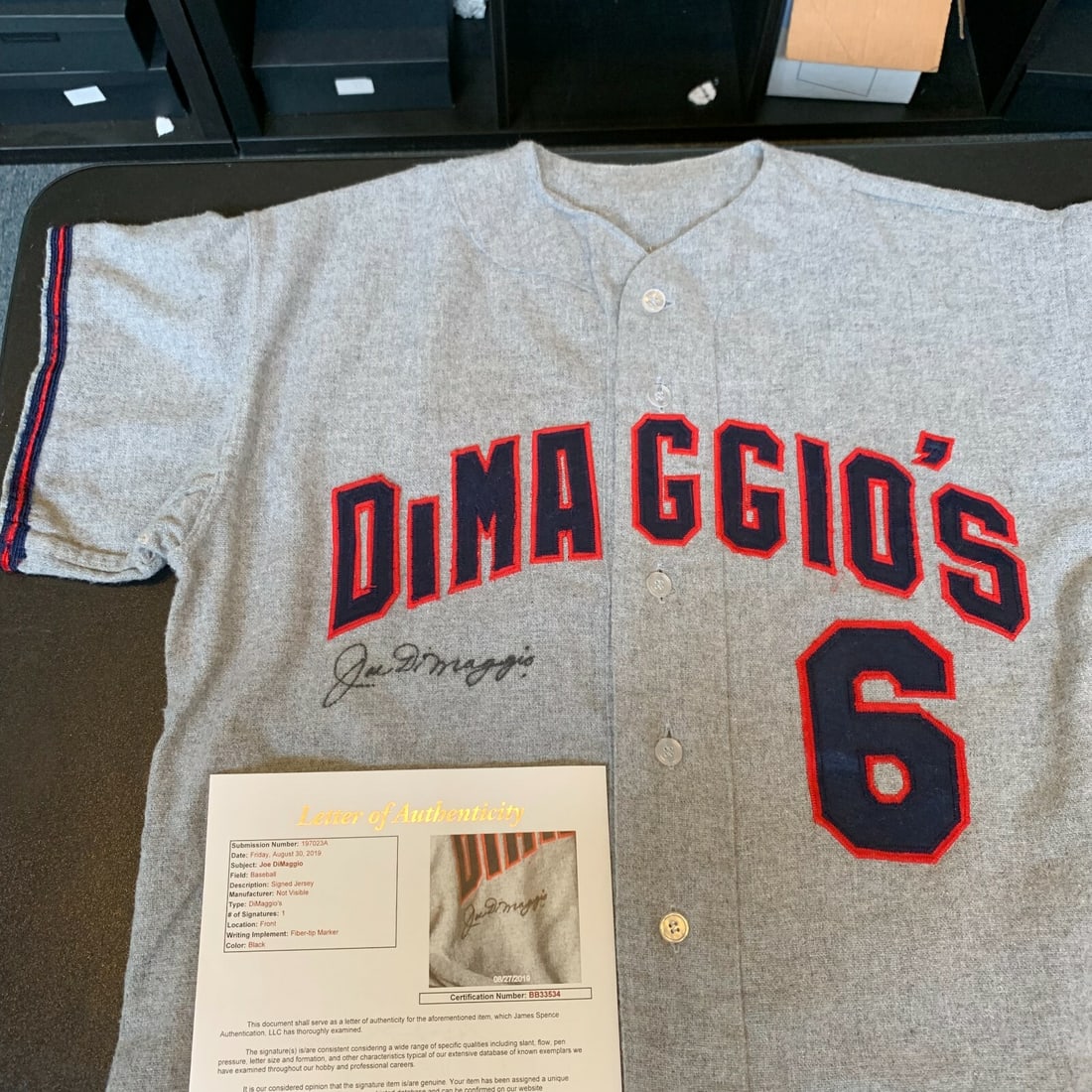 Joe DiMaggio Signed 1950s Yankees Jersey with JSA COA: Joe DiMaggio Signed 1950s Yankees Jersey with JSA COA This authentic 1950's baseball jersey, signed by the legendary Joe DiMaggio, is a remarkable piece of sports memorabilia. Originally worn by a sem