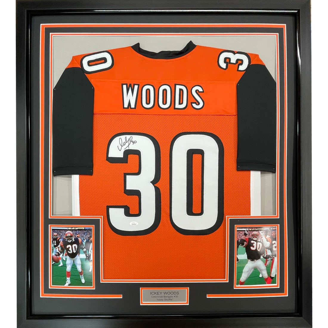 Framed Ickey Woods Signed Bengals Jersey 33x42 JSA COA: Framed Ickey Woods Signed Bengals Jersey 33x42 JSA COA This professionally framed and matted Cincinnati Bengals orange jersey features the authentic signature of Ickey Woods. The display includes two 