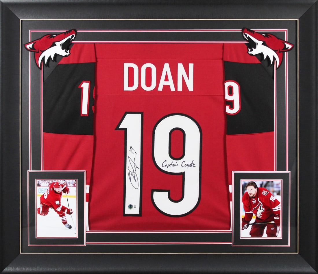 Framed Maroon Signed Shane Doan Jersey Captain Coyote BAS Beckett: Framed Maroon Signed Shane Doan Jersey Captain Coyote BAS Beckett This autographed maroon pro style framed jersey has been personally signed by Shane Doan of the Arizona Coyotes and includes the inscr