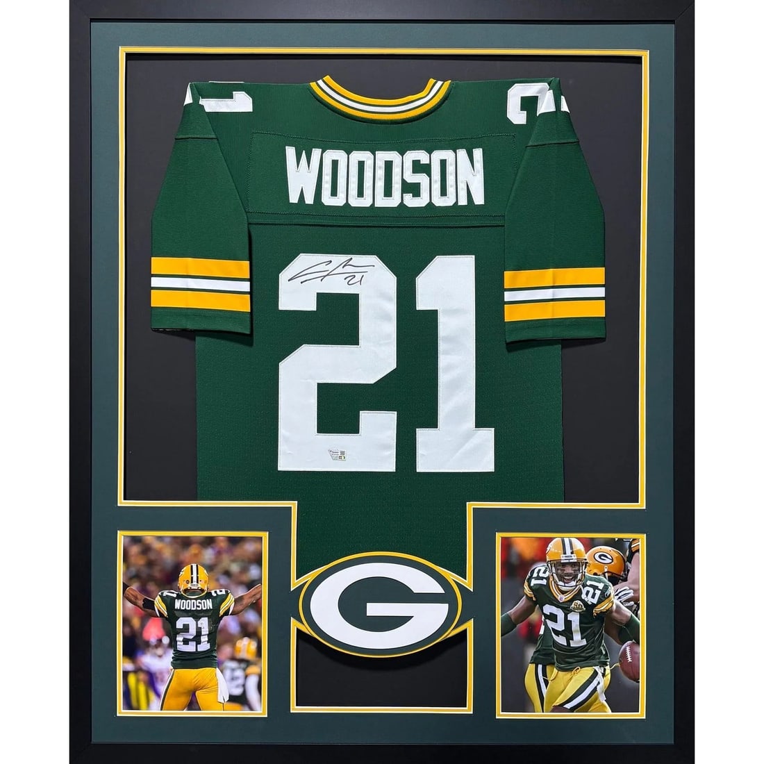 Framed Green Bay Packers Jersey Signed by Charles Woodson with Fanatics Authentication: Framed Green Bay Packers Jersey Signed by Charles Woodson with Fanatics Authentication This framed Green Bay Packers jersey features the authentic signature of Charles Woodson. The jersey is professio