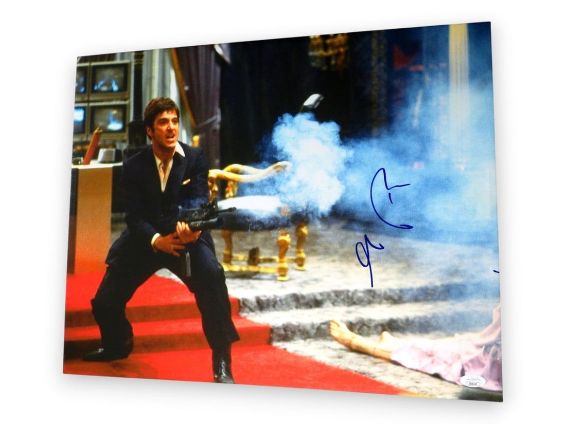 Scarface 16X20 canvas photo signed by Al Pacino JSA authenticated: Scarface 16X20 canvas photo signed by Al Pacino JSA authenticated Autographed 16x20 canvas photograph featuring Al Pacino, with a Scarface shooting image. The piece is professionally mounted and ready