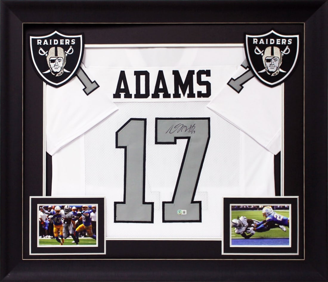 Framed Davante Adams Signed White Raiders Jersey Beckett Witness Authentication: Framed Davante Adams Signed White Raiders Jersey Beckett Witness Authentication This professionally framed white Color Rush Pro Style jersey has been hand-signed by Davante Adams of the Las Vegas Raid