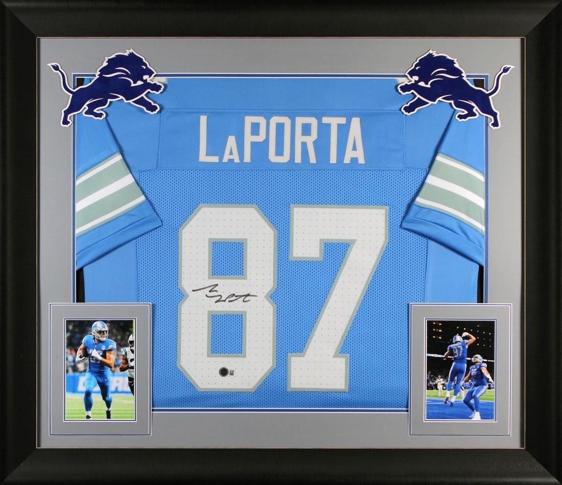 Framed Detroit Lions Sam Laporta Signed Blue Pro Style Jersey Beckett Witnessed: Framed Detroit Lions Sam Laporta Signed Blue Pro Style Jersey Beckett Witnessed This autographed blue pro style framed jersey has been personally signed by Sam Laporta of the Detroit Lions. It is an o