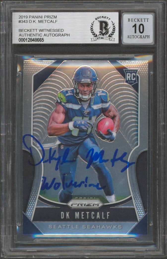 D.K. Metcalf Rookie Prizm Card Signed Gem Mint 10 Beckett Slabbed Auto: D.K. Metcalf Rookie Prizm Card Signed Gem Mint 10 Beckett Slabbed Auto This 2019 Panini Prizm #343 rookie card features D.K. Metcalf of the Seattle Seahawks and includes his autograph with the inscrip