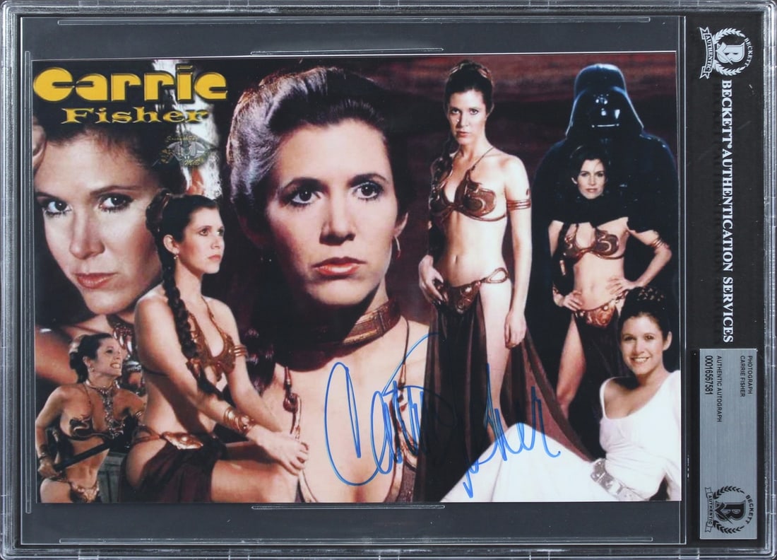 Carrie Fisher Signed 8x10 Star Wars Photo Beckett Authenticated Slab: Carrie Fisher Signed 8x10 Star Wars Photo Beckett Authenticated Slab This 8x10 photograph features an authentic autograph by Carrie Fisher from Star Wars. The item has been personally signed and comes