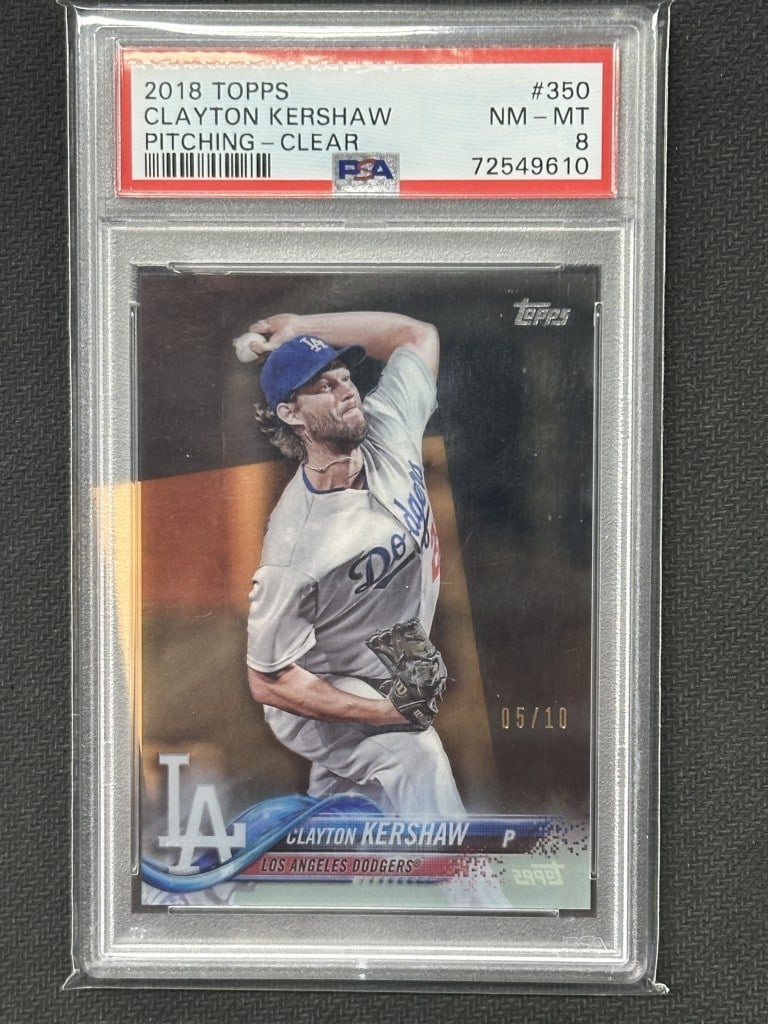 2018 Topps Clear Clayton Kershaw PSA 8 Dodgers #350: 2018 Topps Clear Clayton Kershaw PSA 8 Dodgers #350 This is a 2018 Topps Pitching Clear baseball card featuring Clayton Kershaw of the Los Angeles Dodgers. The card is graded 8 by Professional Sports 