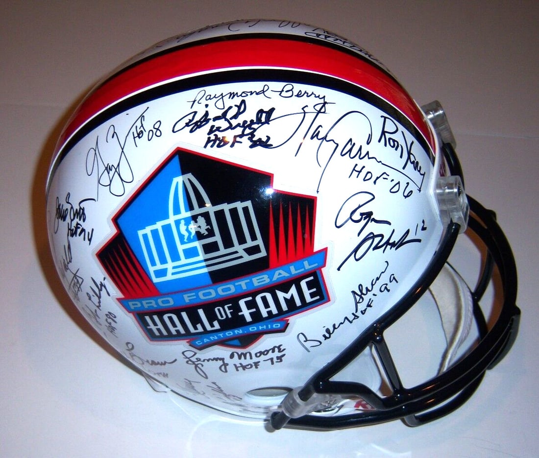 Full Size Signed Football Helmet 29 Autographs JSA COA Staubach Young Harris: Full Size Signed Football Helmet 29 Autographs JSA COA Staubach Young Harris Full-size football helmet with multiple signatures, including Roger Staubach, Steve Young, and Franco Harris. The item is d