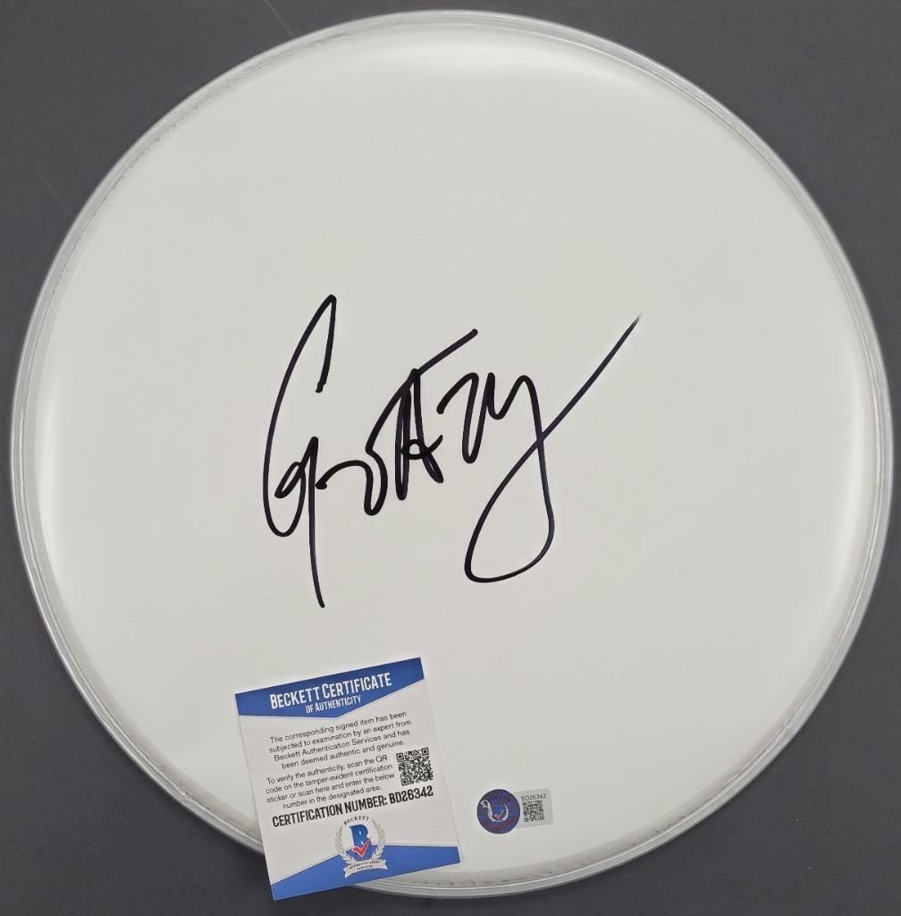 12 Inch Drumhead Signed by G Eazy with Beckett Authentication: 12 Inch Drumhead Signed by G Eazy with Beckett Authentication This 12-inch drumhead is signed by rapper G Eazy and includes authentication by Beckett. The drumhead is an original item from the United 