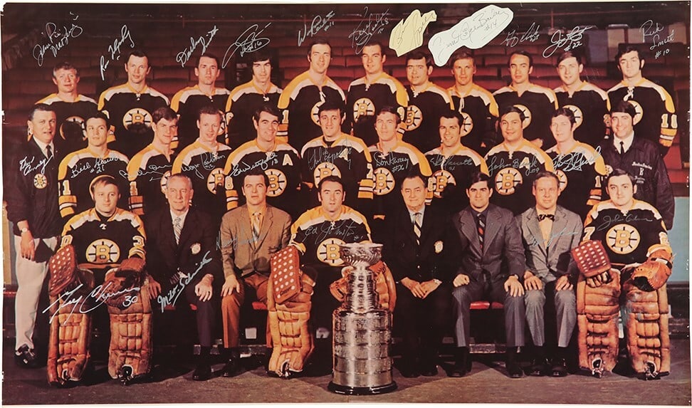1969-70 Boston Bruins Team Signed 21x36 Photo with JSA COA: 1969-70 Boston Bruins Team Signed 21x36 Photo with JSA COA Celebrate the legendary 1969-70 Stanley Cup Champion Boston Bruins with this large 21x36 photo, beautifully signed by members of the team. Th