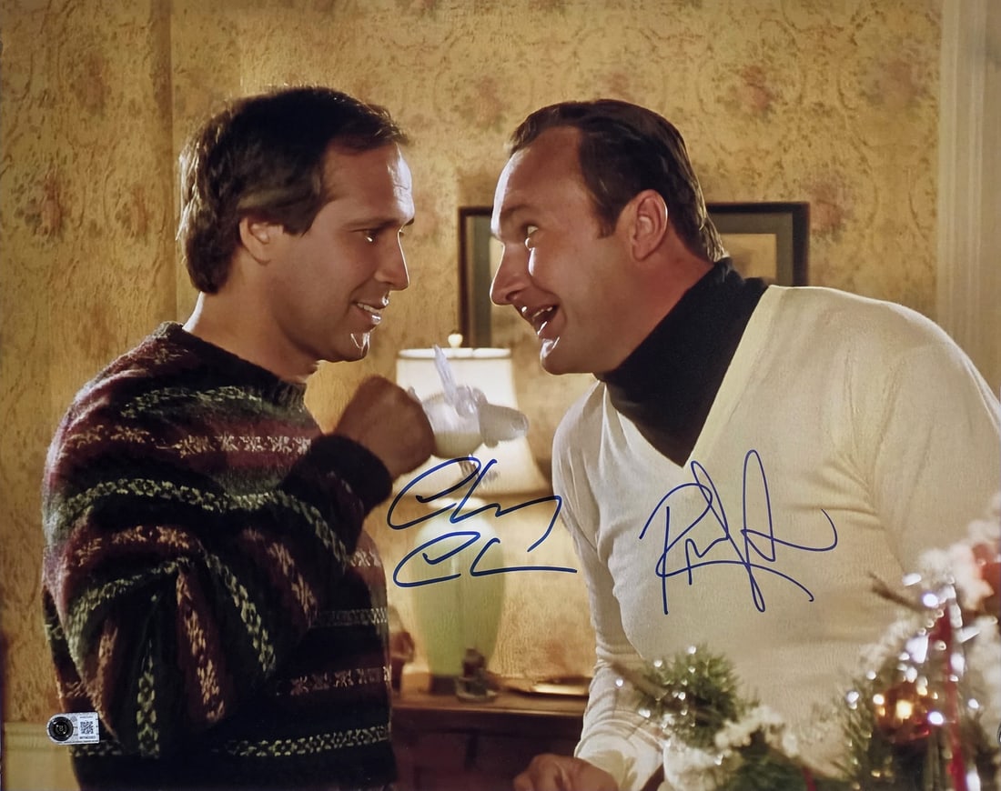 Signed 16x20 Christmas Vacation photo by Chevy Chase and Randy Quaid BAS witnessed: Signed 16x20 Christmas Vacation photo by Chevy Chase and Randy Quaid BAS witnessed This 16x20 photograph features authentic signatures from Chevy Chase and Randy Quaid, stars of National Lampoon's Chr