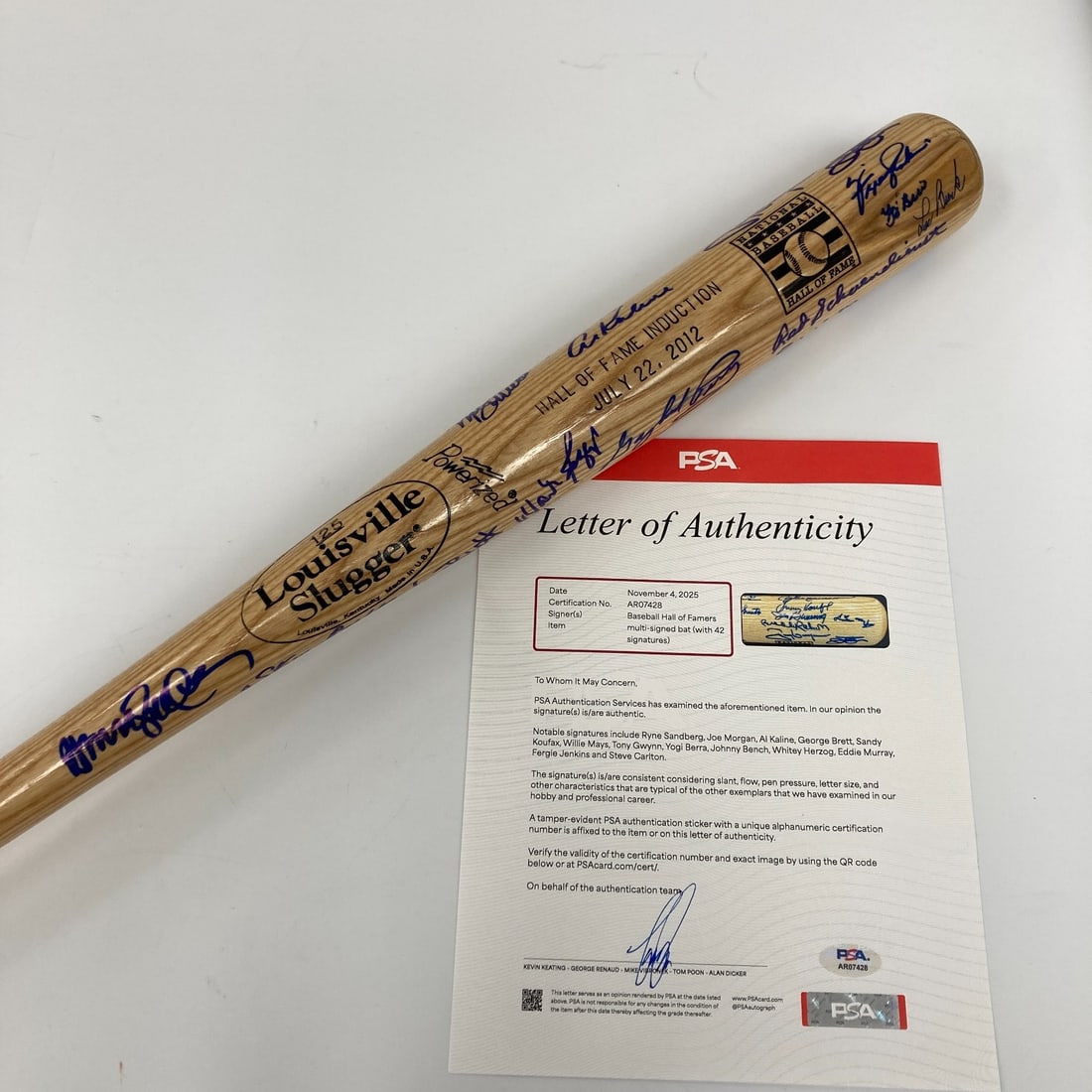 Baseball Bat Signed by 42 Hall of Fame Inductees Including Sandy Koufax PSA Authenticated: Baseball Bat Signed by 42 Hall of Fame Inductees Including Sandy Koufax PSA Authenticated This 2012 Hall of Fame Induction baseball bat is an original collectible featuring 42 signatures from legendar