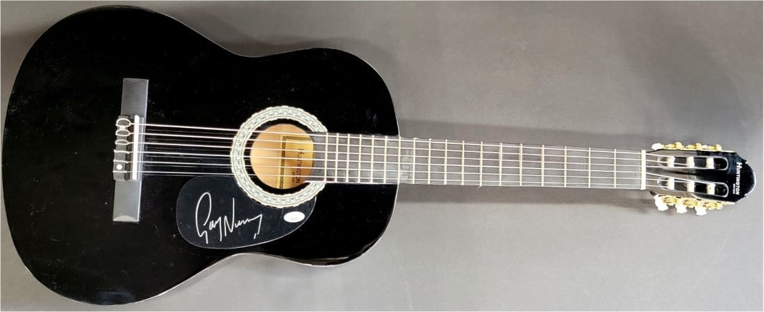Gary Numan Signed Acoustic Guitar Tubeway Army JSA Certified: Gary Numan Signed Acoustic Guitar Tubeway Army JSA Certified This is a genuine Gary Numan autographed acoustic guitar, featuring an original signature authenticated by James Spence Authentication (JSA