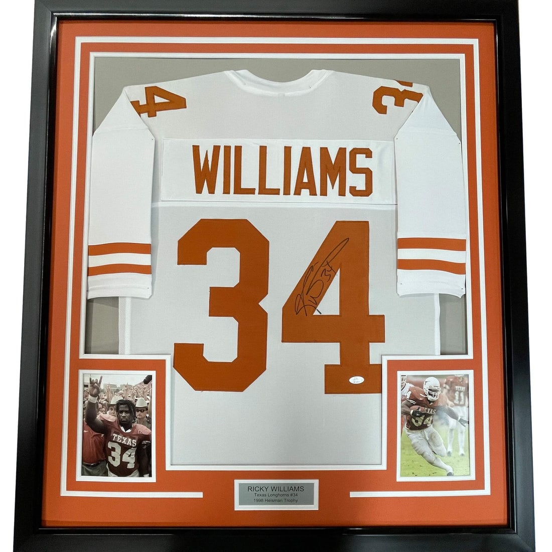 Framed Ricky Williams Autographed Texas Longhorns Jersey with JSA COA: Framed Ricky Williams Autographed Texas Longhorns Jersey with JSA COA Celebrate your love for college football with this professionally framed and autographed Ricky Williams Texas Longhorns jersey. Th