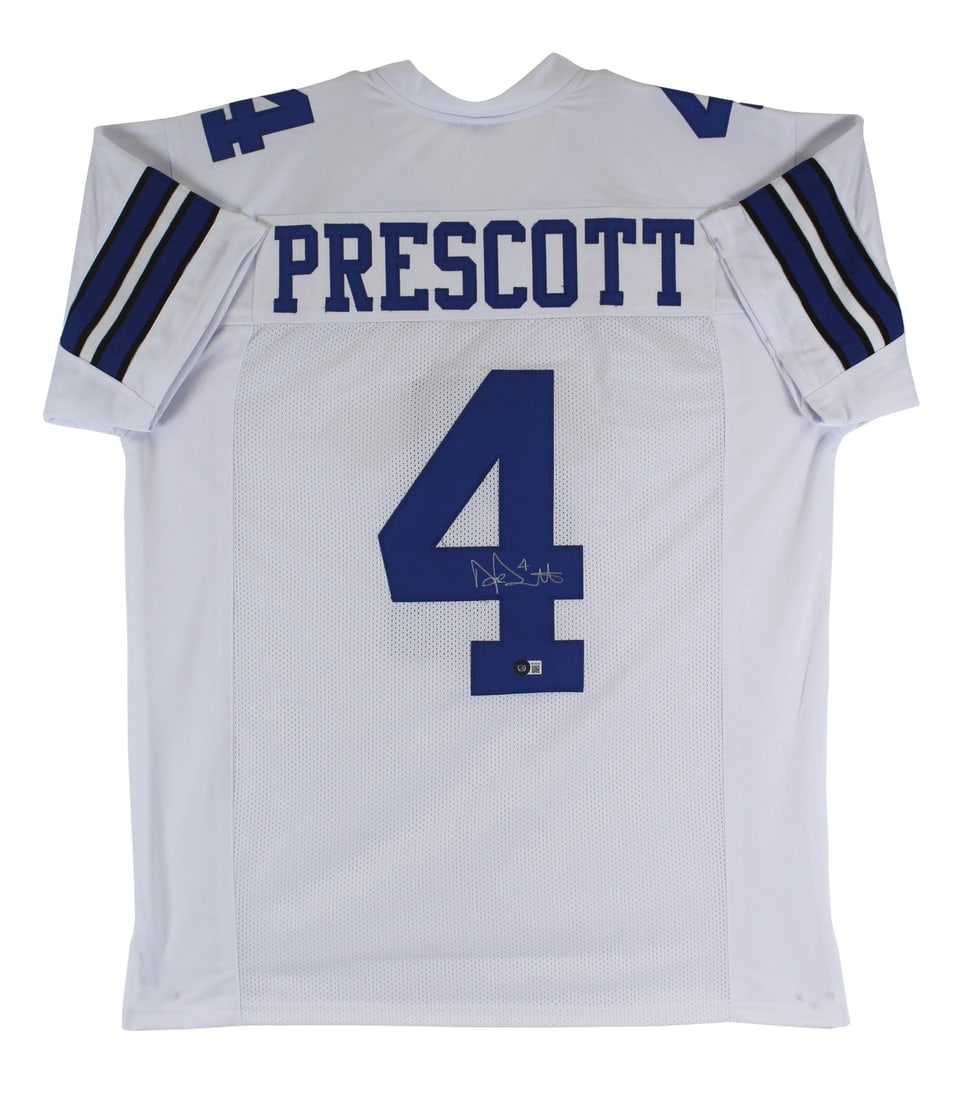 Dak Prescott Signed White Pro Style Jersey BAS Witnessed Dallas Cowboys: Dak Prescott Signed White Pro Style Jersey BAS Witnessed Dallas Cowboys This authentic white pro style jersey has been personally signed by Dak Prescott, quarterback for the Dallas Cowboys. This origi