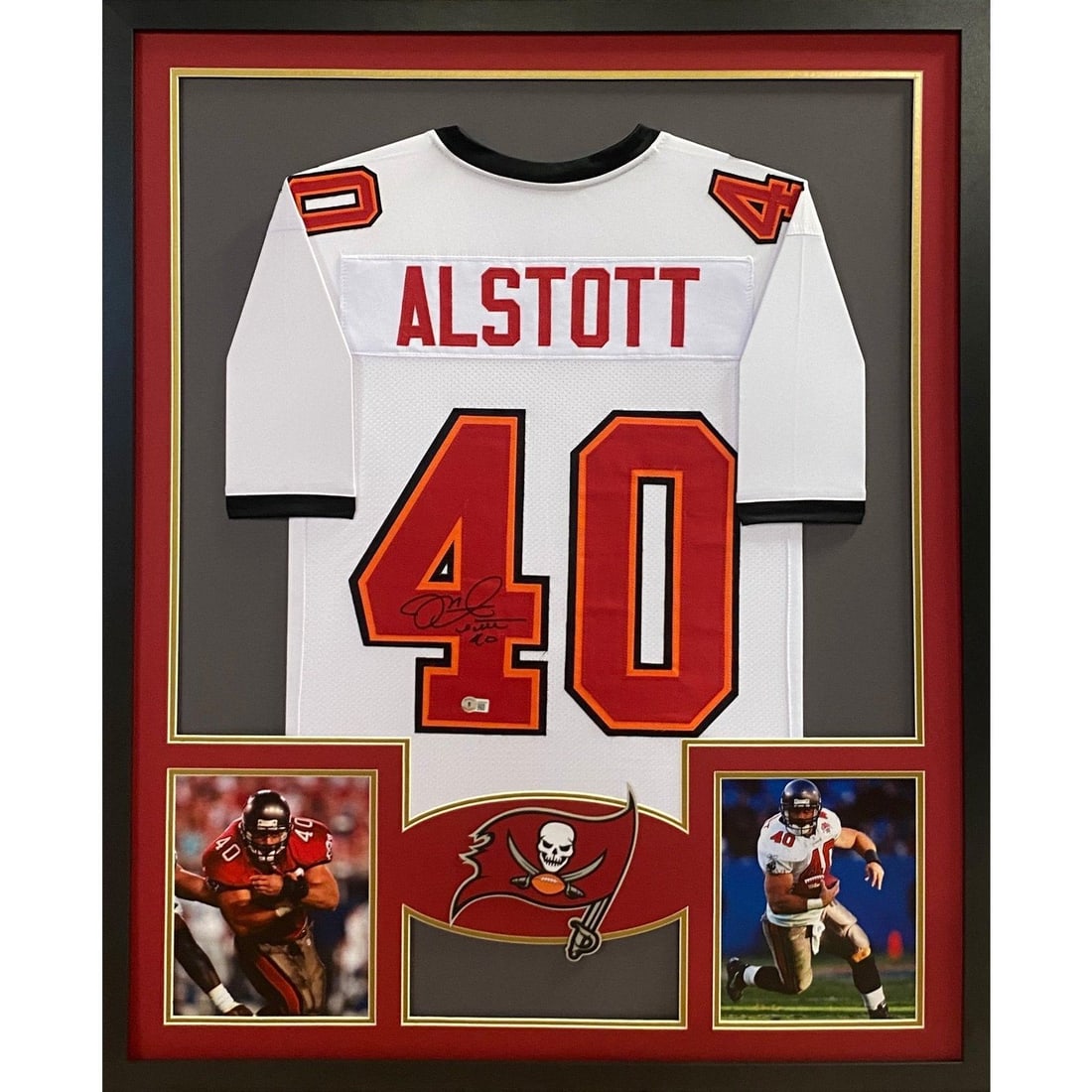 Mike Alstott Autographed Framed Jersey Beckett Certified Tampa Bay Buccaneers: Mike Alstott Autographed Framed Jersey Beckett Certified Tampa Bay Buccaneers This framed jersey features the signature of Mike Alstott, a renowned player for the Tampa Bay Buccaneers. Authenticated b