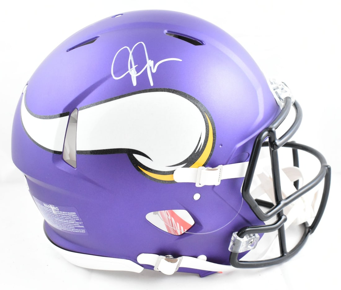 Minnesota Vikings Full Size Helmet Signed by Justin Jefferson Beckett Hologram: Minnesota Vikings Full Size Helmet Signed by Justin Jefferson Beckett Hologram This is a pre-owned Minnesota Vikings Speed Authentic full-size helmet, autographed by Justin Jefferson. The helmet is an