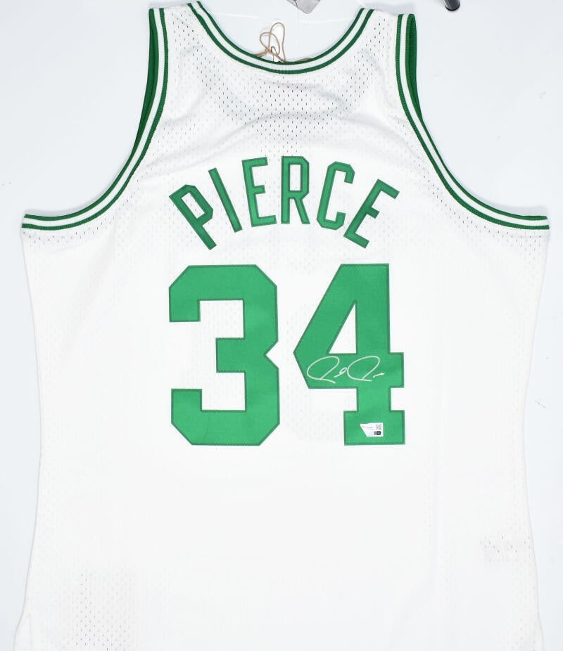 Autographed Boston Celtics Paul Pierce Mitchell Ness Swingman Jersey: Autographed Boston Celtics Paul Pierce Mitchell Ness Swingman Jersey This Boston Celtics Mitchell & Ness HWC Swingman jersey features a signature from Paul Pierce. It is an original, pre-owned basketb