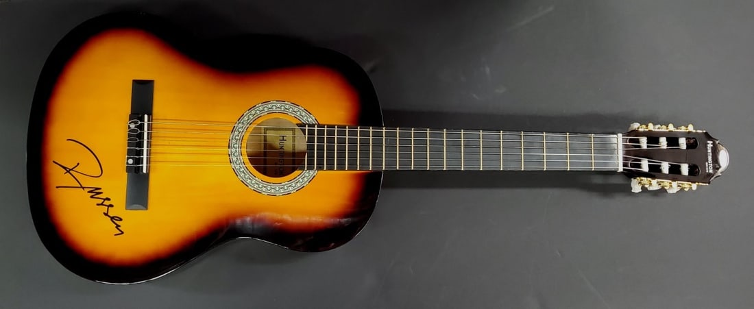 Russell Crowe Autographed Guitar JSA Authentic Signature Movie Star: Russell Crowe Autographed Guitar JSA Authentic Signature Movie Star This is an original electric guitar autographed by the acclaimed actor and musician Russell Crowe. The signature is authenticated by