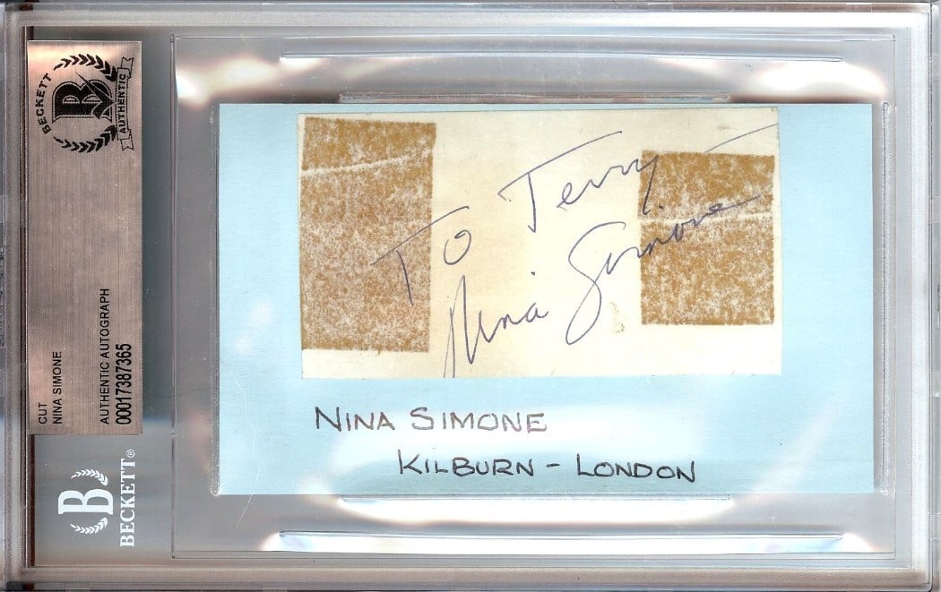 Nina Simone Autographed Cut Signature Beckett Authenticated: Nina Simone Autographed Cut Signature Beckett Authenticated Experience a piece of music history with this autographed cut signature of Nina Simone, the legendary singer and songwriter. This original c