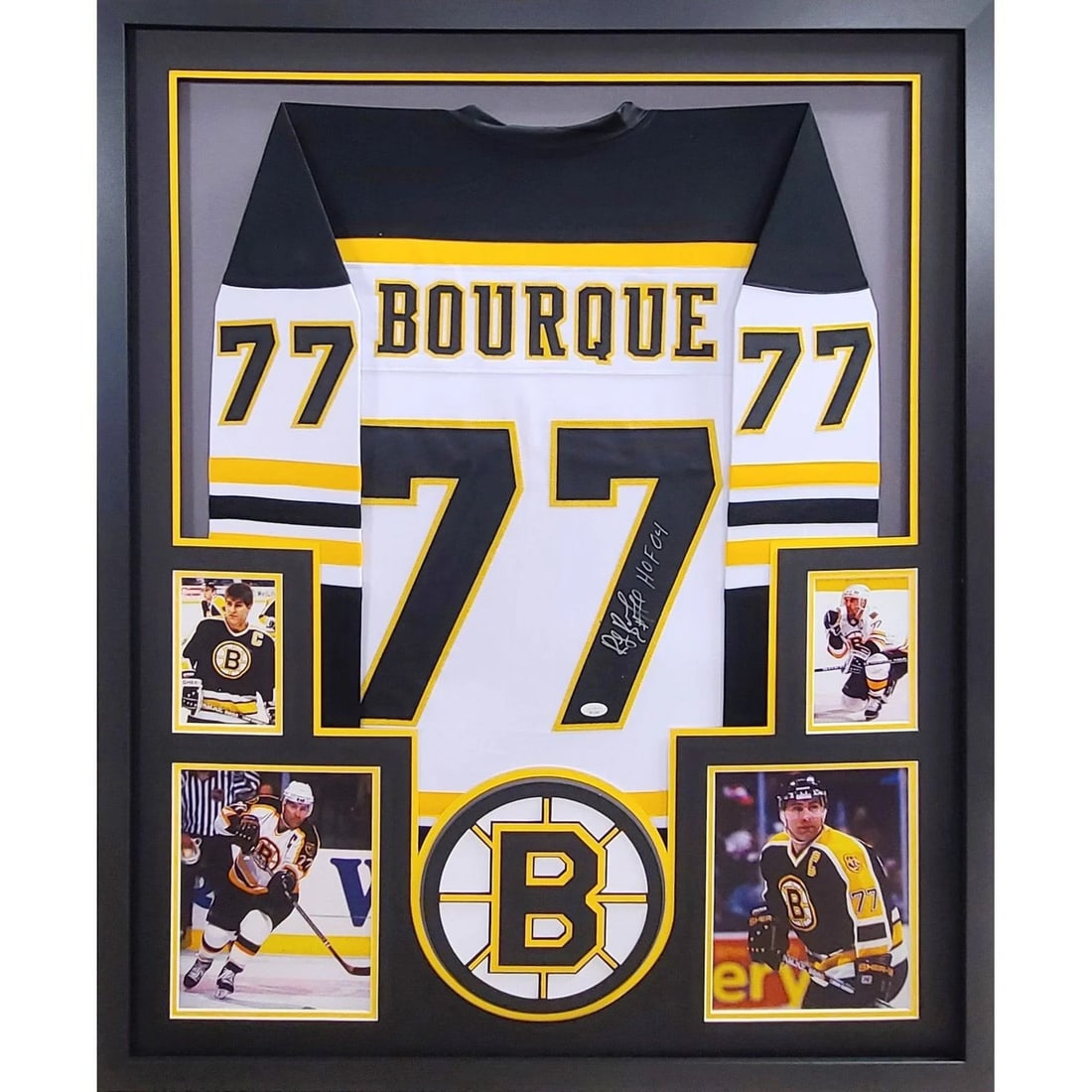 Ray Bourque Autographed Framed Jersey JSA Boston Bruins: Ray Bourque Autographed Framed Jersey JSA Boston Bruins This is a professionally framed jersey autographed by Ray Bourque, a legendary player of the Boston Bruins. The jersey is authenticated by JSA, 