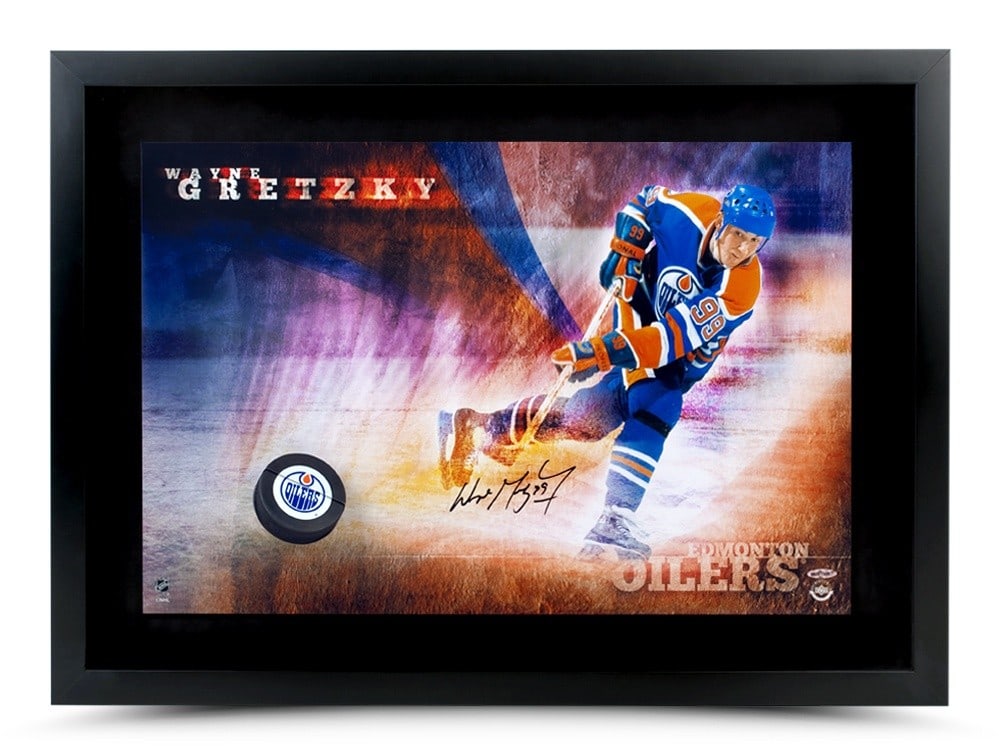 Wayne Gretzky Signed 16x24 Photo Puck Oilers Upper Deck Authenticated: Wayne Gretzky Signed 16x24 Photo Puck Oilers Upper Deck Authenticated This is an original 16X24 photo capturing Wayne Gretzky in action, showcasing a slap shot as he breaks through the defense, repres