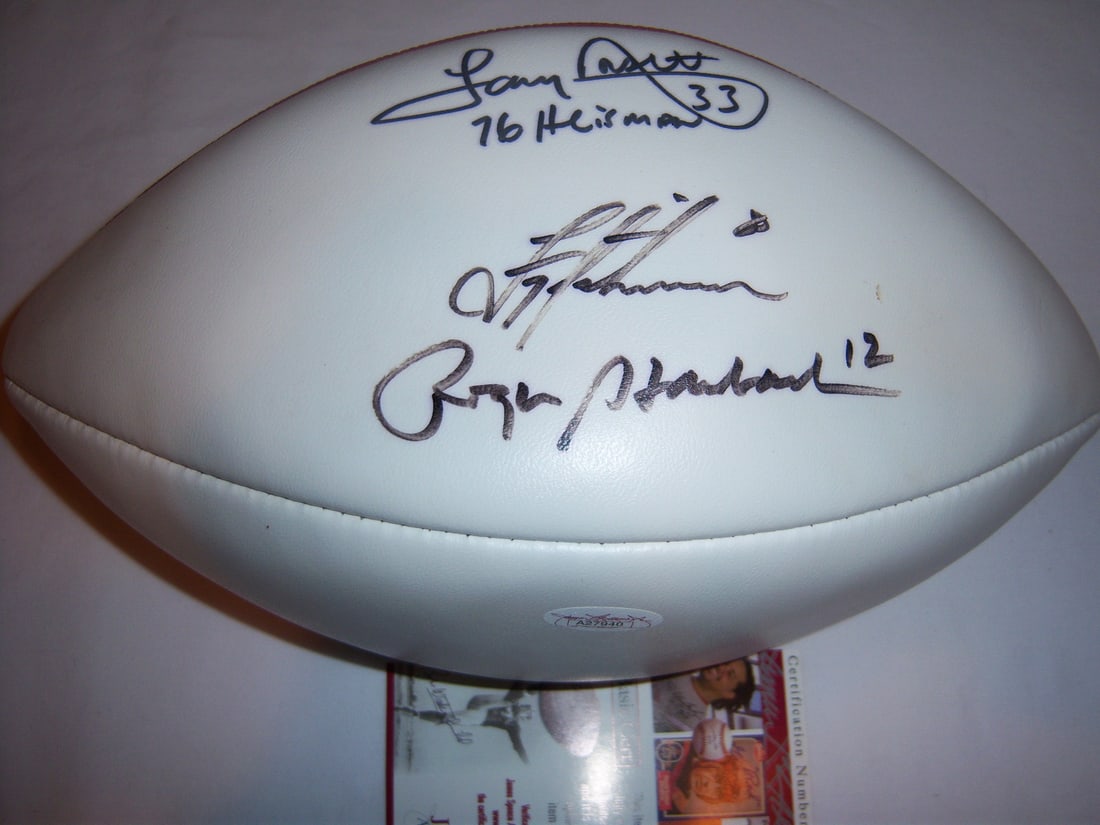 Signed Dallas Cowboys Football JSA COA Staubach Aikman Dorsett: Signed Dallas Cowboys Football JSA COA Staubach Aikman Dorsett This football has been signed by Roger Staubach, Troy Aikman, and Tony Dorsett of the Dallas Cowboys. It is an original item and comes wi