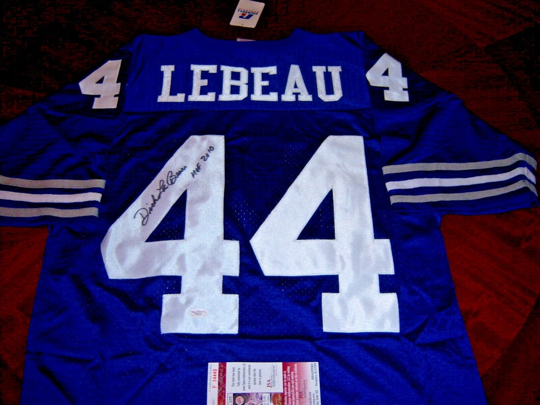 Russell Detroit Lions Jersey Autographed by Dick LeBeau with JSA COA: Russell Detroit Lions Jersey Autographed by Dick LeBeau with JSA COA This is an officially licensed Russell jersey for the Detroit Lions, autographed by Dick LeBeau. The jersey is an original item and
