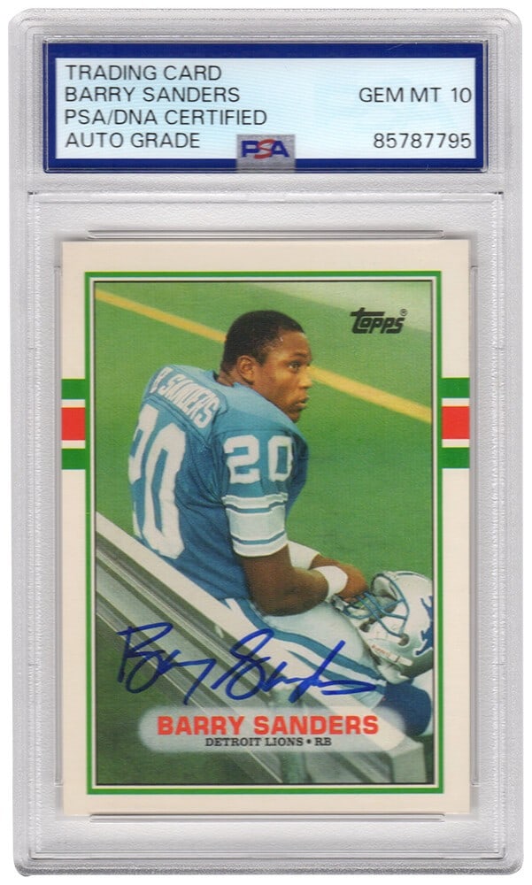 PSA DNA Barry Sanders Lions 1989 Topps Rookie Card Auto 10: PSA DNA Barry Sanders Lions 1989 Topps Rookie Card Auto 10 This is a Barry Sanders signed 1989 Topps rookie football card #83T featuring the Detroit Lions. The card has been authenticated and encapsul