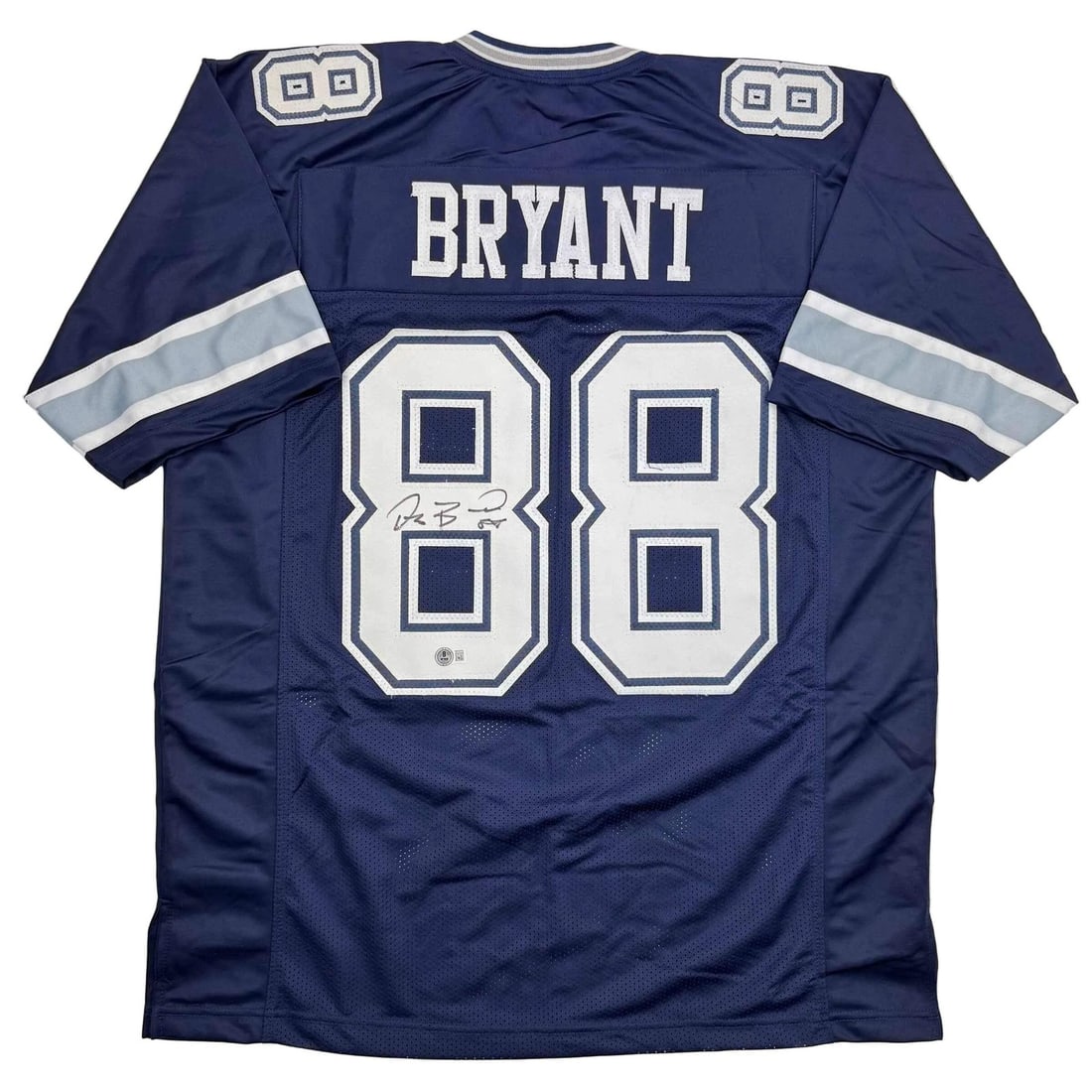 Dez Bryant Signed Dallas Custom Blue Jersey Beckett Authenticated Autograph: Dez Bryant Signed Dallas Custom Blue Jersey Beckett Authenticated Autograph This is a custom Dallas blue football jersey autographed by Dez Bryant. The jersey features Bryant's name and number and is 