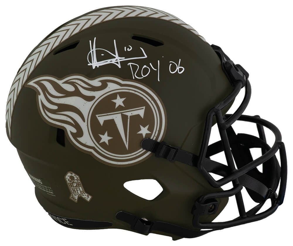 Vince Young Signed Titans Salute Riddell Full Size Helmet ROY 06 COA: Vince Young Signed Titans Salute Riddell Full Size Helmet ROY 06 COA This is a signed Tennessee Titans Salute Riddell full-size speed replica helmet by Vince Young, featuring the inscription 'ROY 06'.