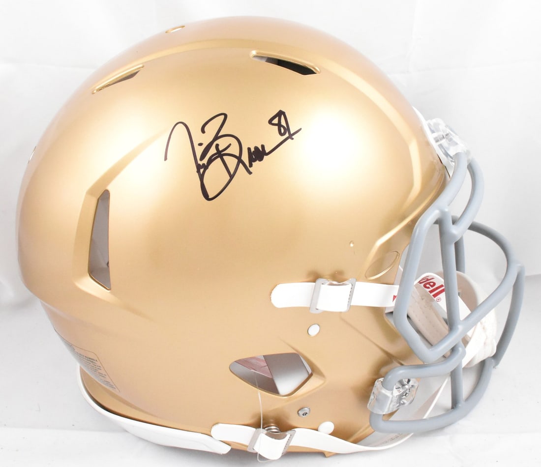 Notre Dame Full Size Speed Authentic Helmet Signed by Tim Brown Fanatics: Notre Dame Full Size Speed Authentic Helmet Signed by Tim Brown Fanatics This is a pre-owned Notre Dame full-size Speed Authentic football helmet autographed by Tim Brown. The helmet is an original it