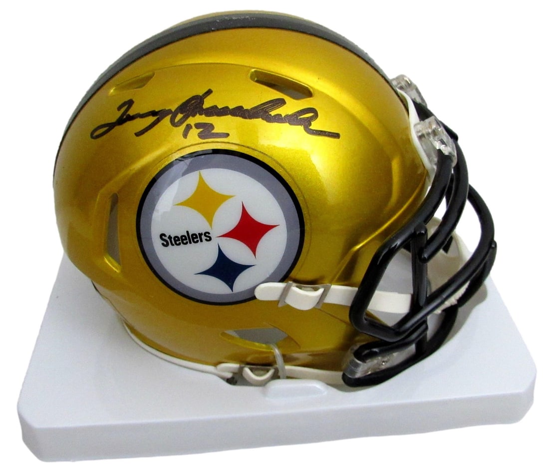 Terry Bradshaw Autographed Steelers Gold Flash Mini Football Helmet Beckett Authenticated: Terry Bradshaw Autographed Steelers Gold Flash Mini Football Helmet Beckett Authenticated This is an original Pittsburgh Steelers mini football helmet in a gold flash finish, signed by Hall of Famer T