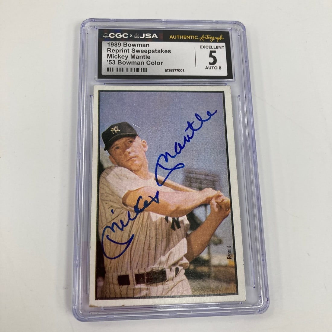 Mickey Mantle 1989 Bowman Color RP Autographed Baseball Card CGC JSA: Mickey Mantle 1989 Bowman Color RP Autographed Baseball Card CGC JSA This is a Mickey Mantle signed sports trading card from the 1989 Bowman set, featuring a 1953 Bowman Color reprint. The card is aut
