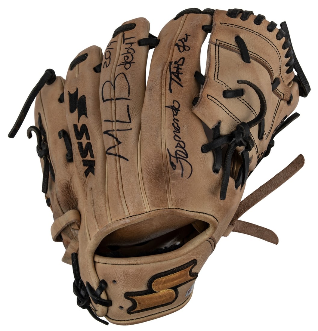 Fernando Tatis Jr. Game-Used Glove with COA and MLB Debut Inscription: Fernando Tatis Jr. Game-Used Glove with COA and MLB Debut Inscription This SSK professional model baseball glove has been game-used by baseball superstar Fernando Tatis Jr. and is photo-matched to six