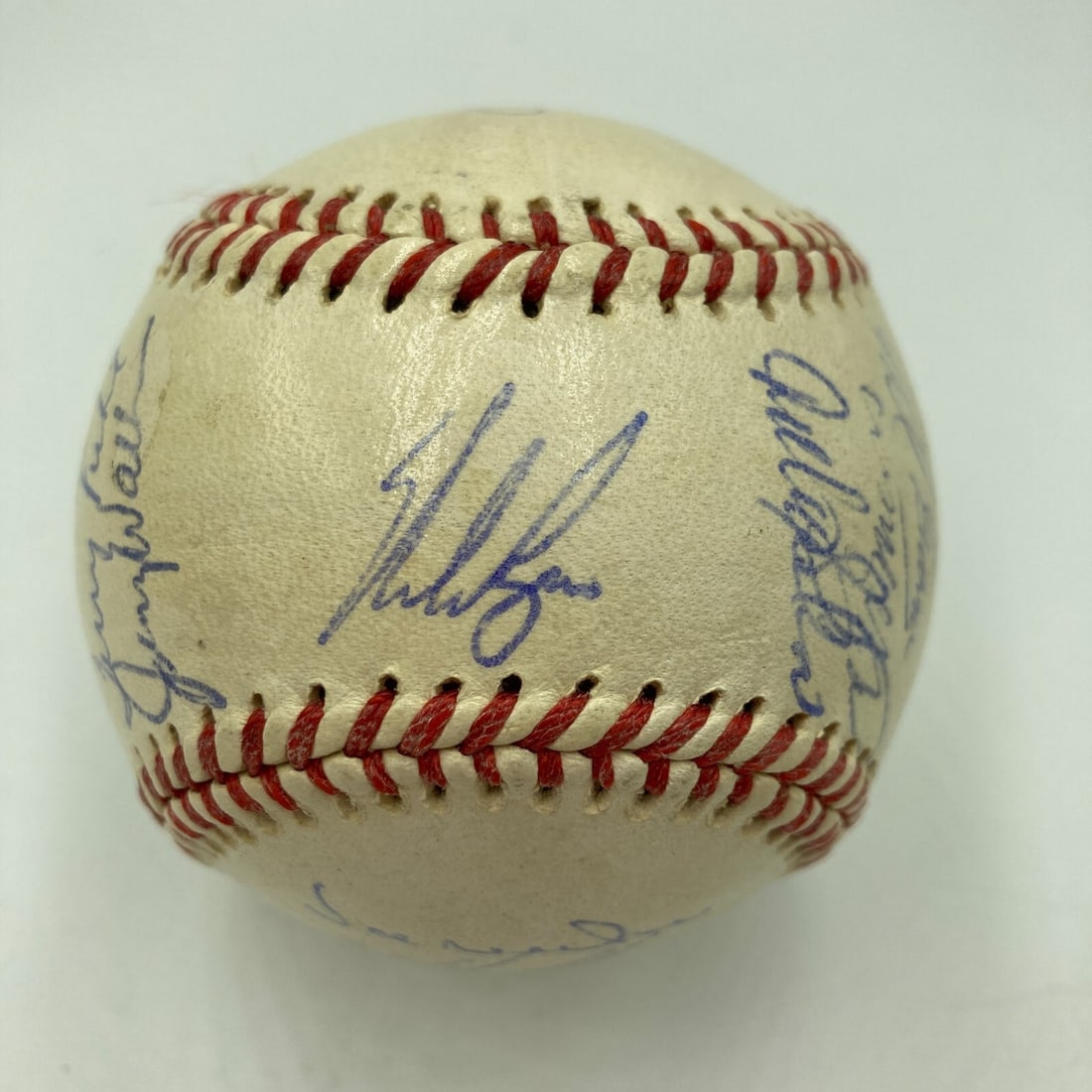 Nolan Ryan 1980s Houston Astros Team Signed Baseball: Nolan Ryan 1980s Houston Astros Team Signed Baseball This is a classic baseball featuring the signature of Hall of Fame pitcher Nolan Ryan, a legend of the Houston Astros from the 1980s. This original