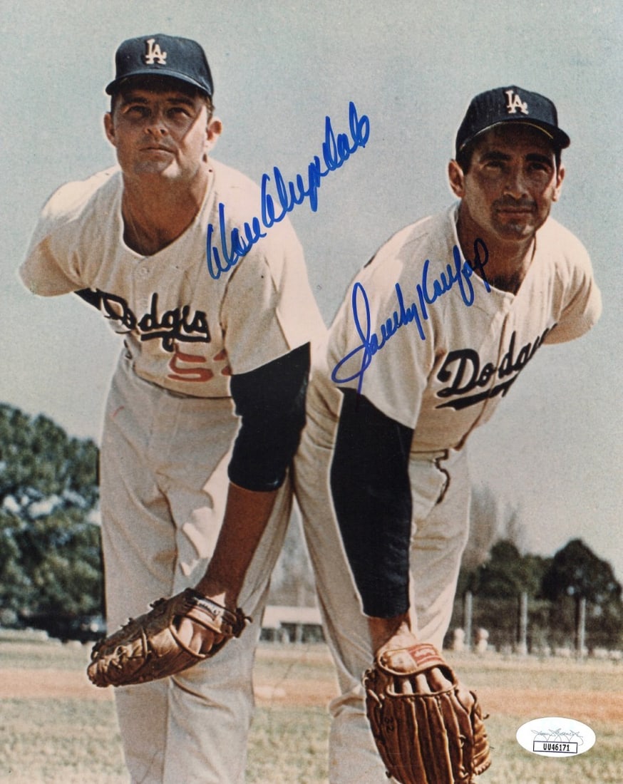 Sandy Koufax Don Drysdale Dual Signed 8X10 Photo Dodgers JSA Authenticated: Sandy Koufax Don Drysdale Dual Signed 8X10 Photo Dodgers JSA Authenticated This remarkable 8x10 photo captures the legendary duo of Sandy Koufax and Don Drysdale, both Hall of Famers and celebrated pi