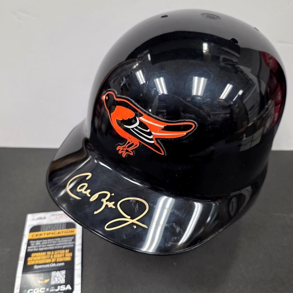 Autographed Baltimore Orioles Helmet Cal Ripken Jr With JSA Authentication: Autographed Baltimore Orioles Helmet Cal Ripken Jr With JSA Authentication This is an original vintage Baltimore Orioles full size helmet signed by Cal Ripken Jr. The autograph is authenticated by Jam