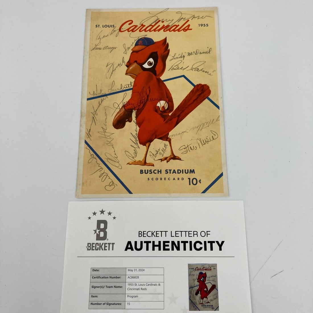 1955 Cardinals Reds Team Signed Scorecard with Beckett COA: 1955 Cardinals Reds Team Signed Scorecard with Beckett COA Own a piece of baseball history with this 1955 St. Louis Cardinals and Cincinnati Reds Team Signed Scorecard. This original program features 