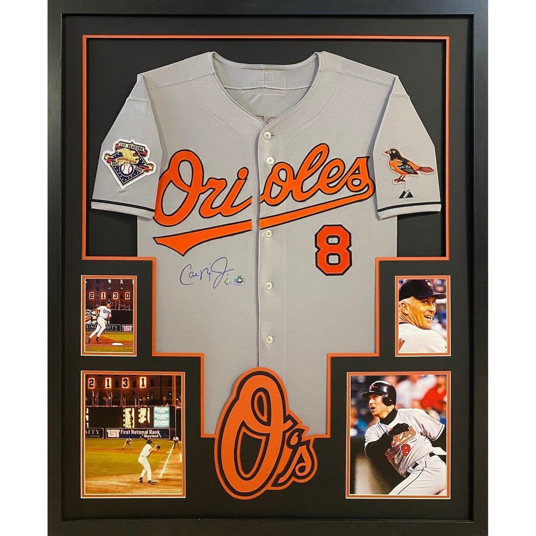 Framed Baltimore Orioles Cal Ripken Autographed Jersey with MLB COA: Framed Baltimore Orioles Cal Ripken Autographed Jersey with MLB COA This framed Baltimore Orioles jersey is autographed by Cal Ripken and comes with MLB authentication and a tamper-proof sticker for v