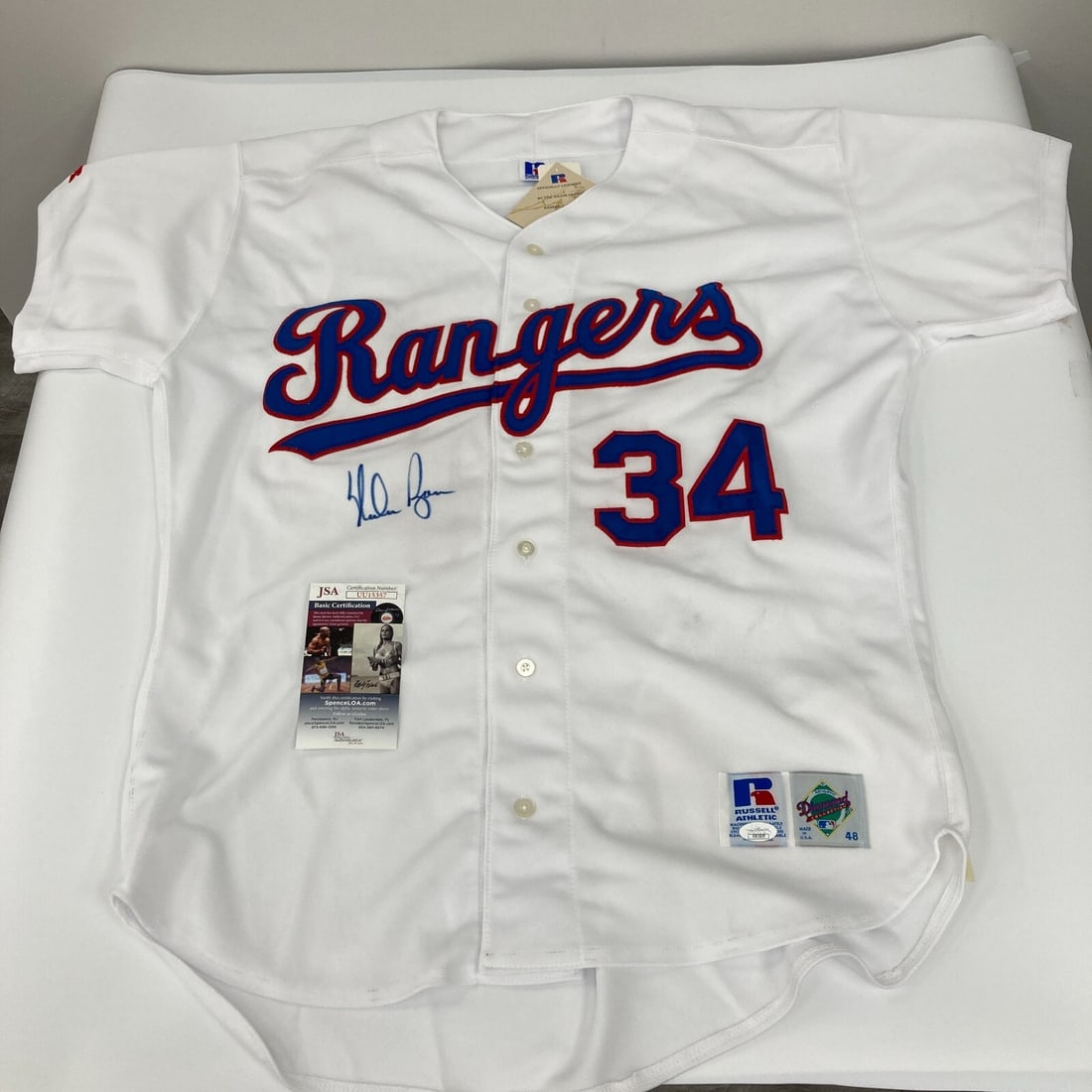 Nolan Ryan Signed Vintage Texas Rangers Jersey with JSA COA: Nolan Ryan Signed Vintage Texas Rangers Jersey with JSA COA Celebrate the legacy of baseball legend Nolan Ryan with this vintage Russell authentic Texas Rangers jersey. This jersey features Ryan's sig
