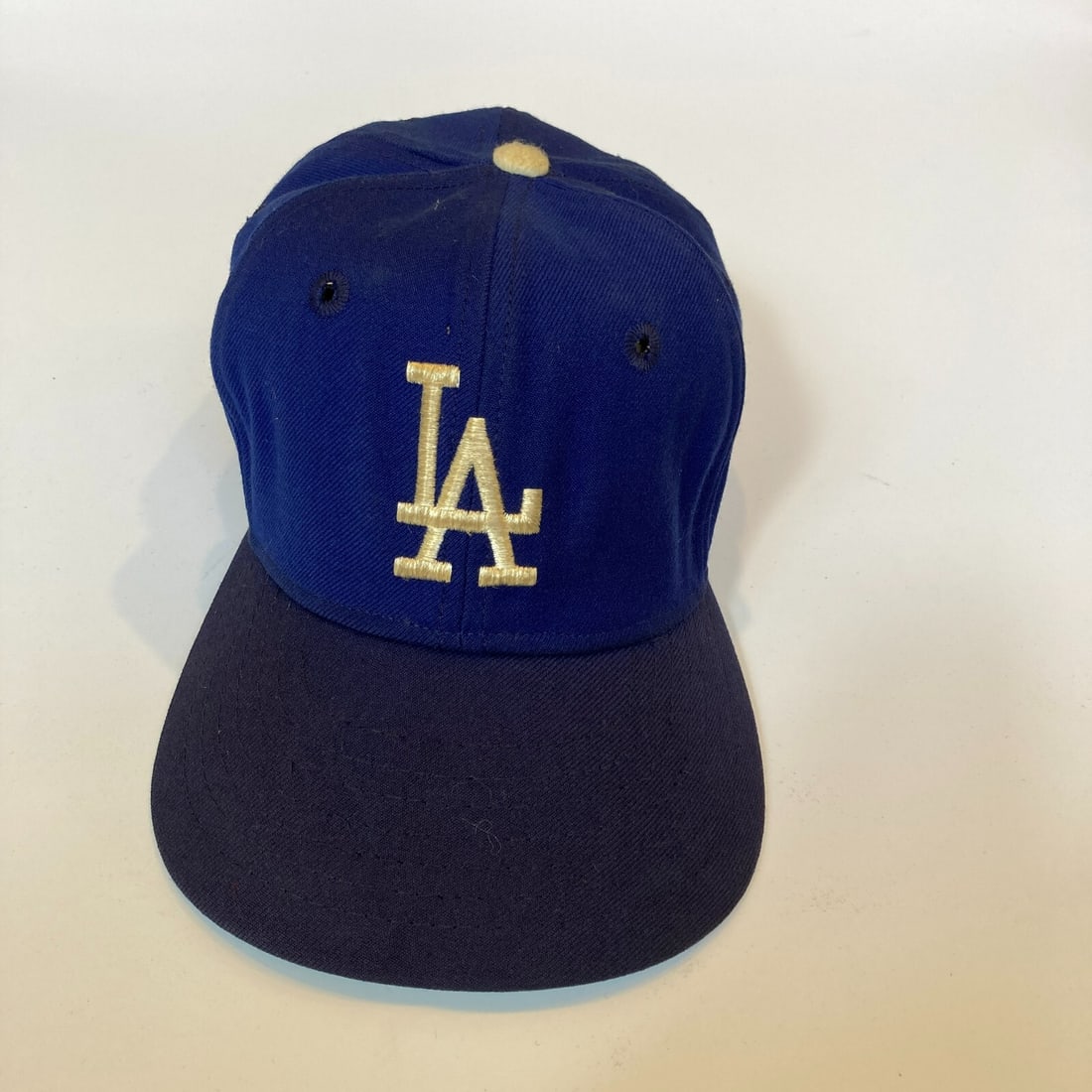 1960s Los Angeles Dodgers KM Game Model Baseball Cap New Tags: 1960s Los Angeles Dodgers KM Game Model Baseball Cap New Tags This vintage 1960's Los Angeles Dodgers KM Game Model Baseball Hat is a true collector's item for any baseball enthusiast. Featuring the i