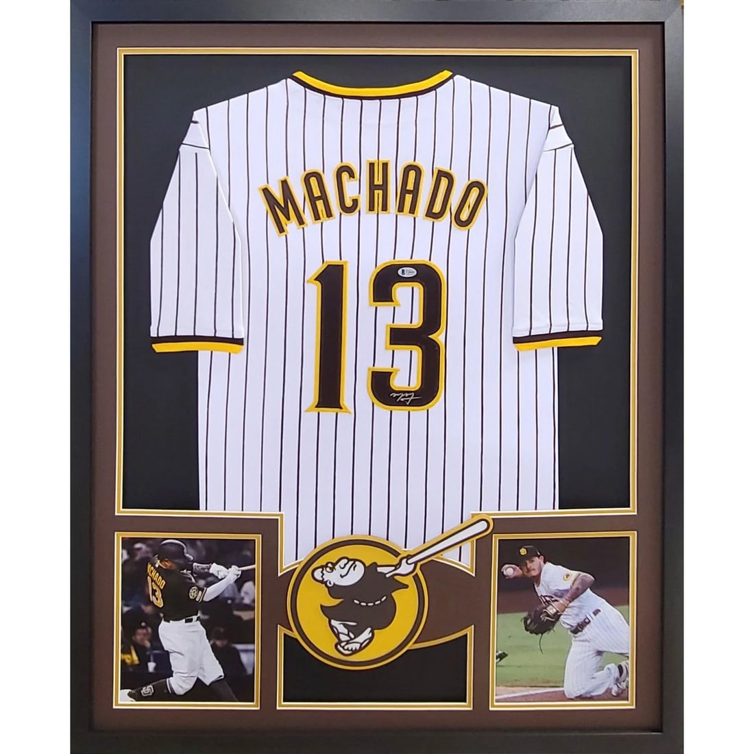 Manny Machado Signed Framed Jersey Beckett Authenticated San Diego Padres: Manny Machado Signed Framed Jersey Beckett Authenticated San Diego Padres This is an autographed Manny Machado framed jersey, showcasing the star player's signature with authenticity certified by Beck