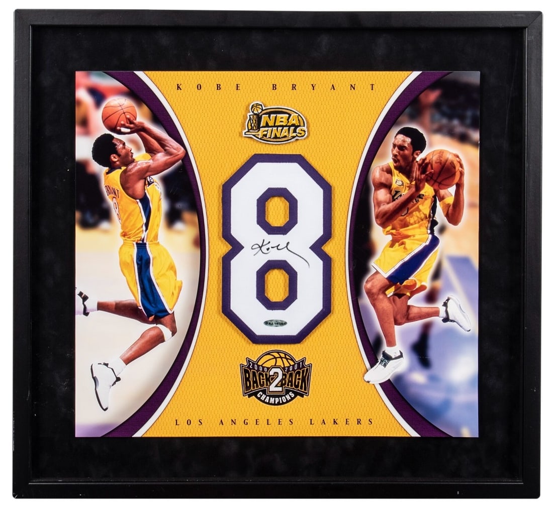 Kobe Bryant Signed 2000-01 Lakers Jersey Display with Upper Deck COA: Kobe Bryant Signed 2000-01 Lakers Jersey Display with Upper Deck COA Celebrate the legacy of Kobe Bryant with this stunning framed display featuring his iconic jersey number "8". This commemorative
