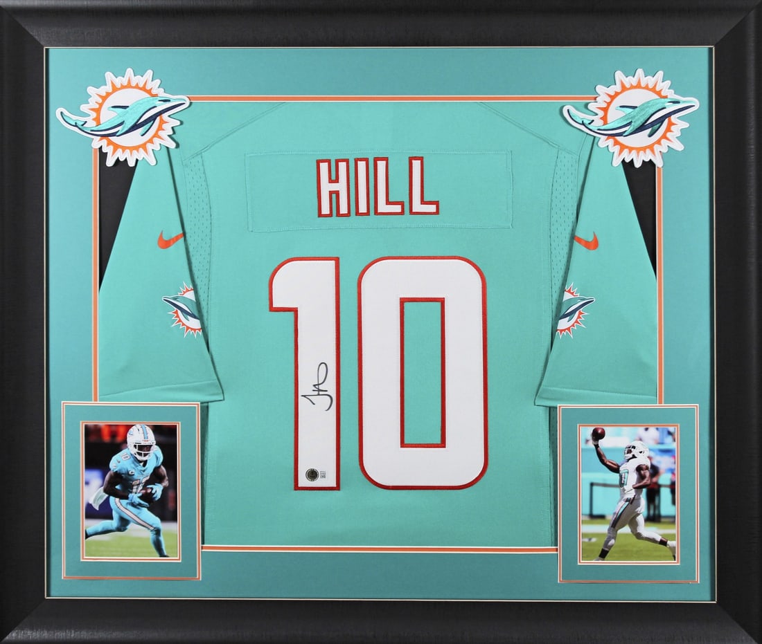 Framed Tyreek Hill Miami Dolphins Nike Teal Signed Jersey BAS Witnessed: Framed Tyreek Hill Miami Dolphins Nike Teal Signed Jersey BAS Witnessed Autographed teal Nike framed jersey signed by Tyreek Hill of the Miami Dolphins. The jersey features sewn numbers, is an origina