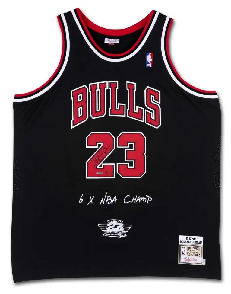 Michael Jordan Signed 1997-98 Bulls Black Jersey Upper Deck Authenticated Limited Edition 123: Michael Jordan Signed 1997-98 Bulls Black Jersey Upper Deck Authenticated Limited Edition 123 This is a Michael Jordan autographed Mitchell & Ness jersey from the 1997-98 NBA season, celebrating one o