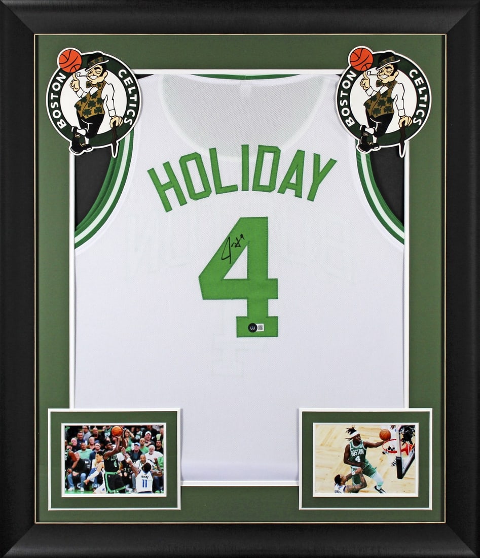 Framed Jrue Holiday Signed White Pro Style Jersey Beckett Witnessed: Framed Jrue Holiday Signed White Pro Style Jersey Beckett Witnessed Autographed white pro style framed jersey personally signed by Jrue Holiday of the Boston Celtics. The item is an original, hand-sig